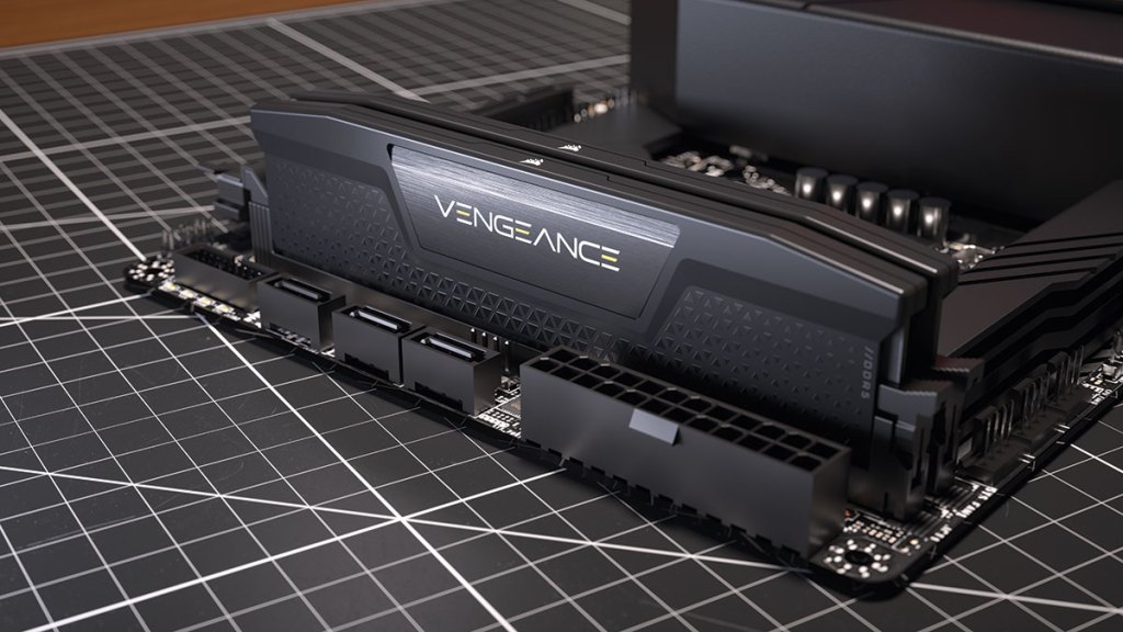 CORSAIR Vengeance DDR5 memory in a SSF motherboard on a black desk.